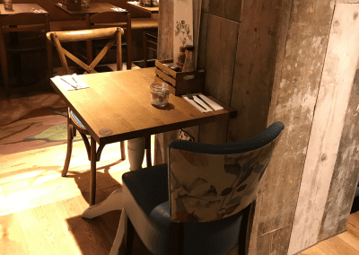 Bespoke furniture and refurbished & reupholstered furniture for an airport restaurant and lounge with a stylish and modern interior.