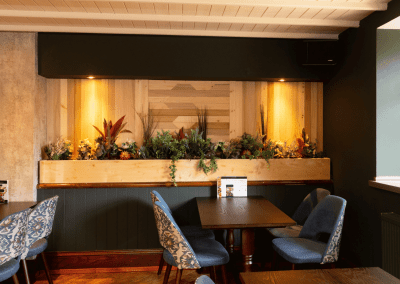 Bespoke pub furniture featuring bold fabrics, vibrant colours, and custom fixed seating by Jameson Seating