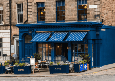 Bespoke café curtains, cushions, and soft furnishings, combining Parisian charm with durable, stylish design.
