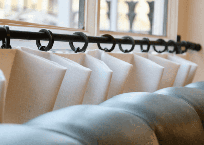 Bespoke eyelet screen curtains for Ganymede Belgravia, creating a stylish and private restaurant space.