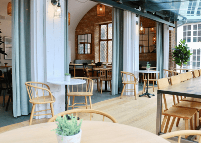 Bespoke curtains and soft furnishings for cafes, in bright and neutral colours to create an inviting and contemporary feel.
