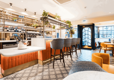 Bespoke café curtains, cushions, and soft furnishings, combining Parisian charm with durable, stylish design.