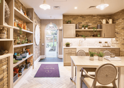 Interior picture of a Signature care home, featuring calming and comfortable furniture in a range of rooms, to support senior living.