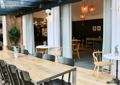 Bespoke curtains and soft furnishings for cafes, in bright and neutral colours to create an inviting and contemporary feel.