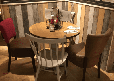 Bespoke furniture and refurbished & reupholstered furniture for The Curator Heathrow, an airport restaurant and lounge with a stylish and modern interior.