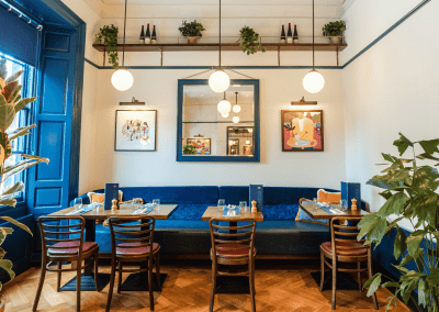 Bespoke café curtains, cushions, and soft furnishings, combining Parisian charm with durable, stylish design.