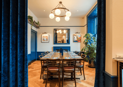 Bespoke café curtains, cushions, and soft furnishings, combining Parisian charm with durable, stylish design.