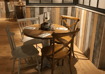 Bespoke furniture and refurbished & reupholstered furniture for The Curator Heathrow, an airport restaurant and lounge with a stylish and modern interior.