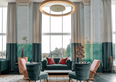 Elegant soft furnishings, featuring bespoke curtains and accent pieces, blending period charm with refined comfort.