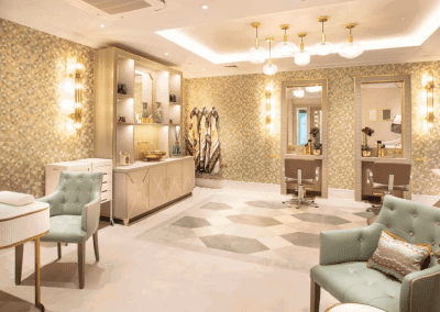 Interior picture of a residential care home, featuring calming and comfortable furniture in a range of rooms, to support senior living.