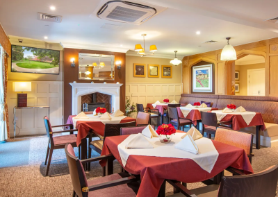Interior picture of a residential care home, featuring calming and comfortable furniture in a range of rooms, to support senior living.