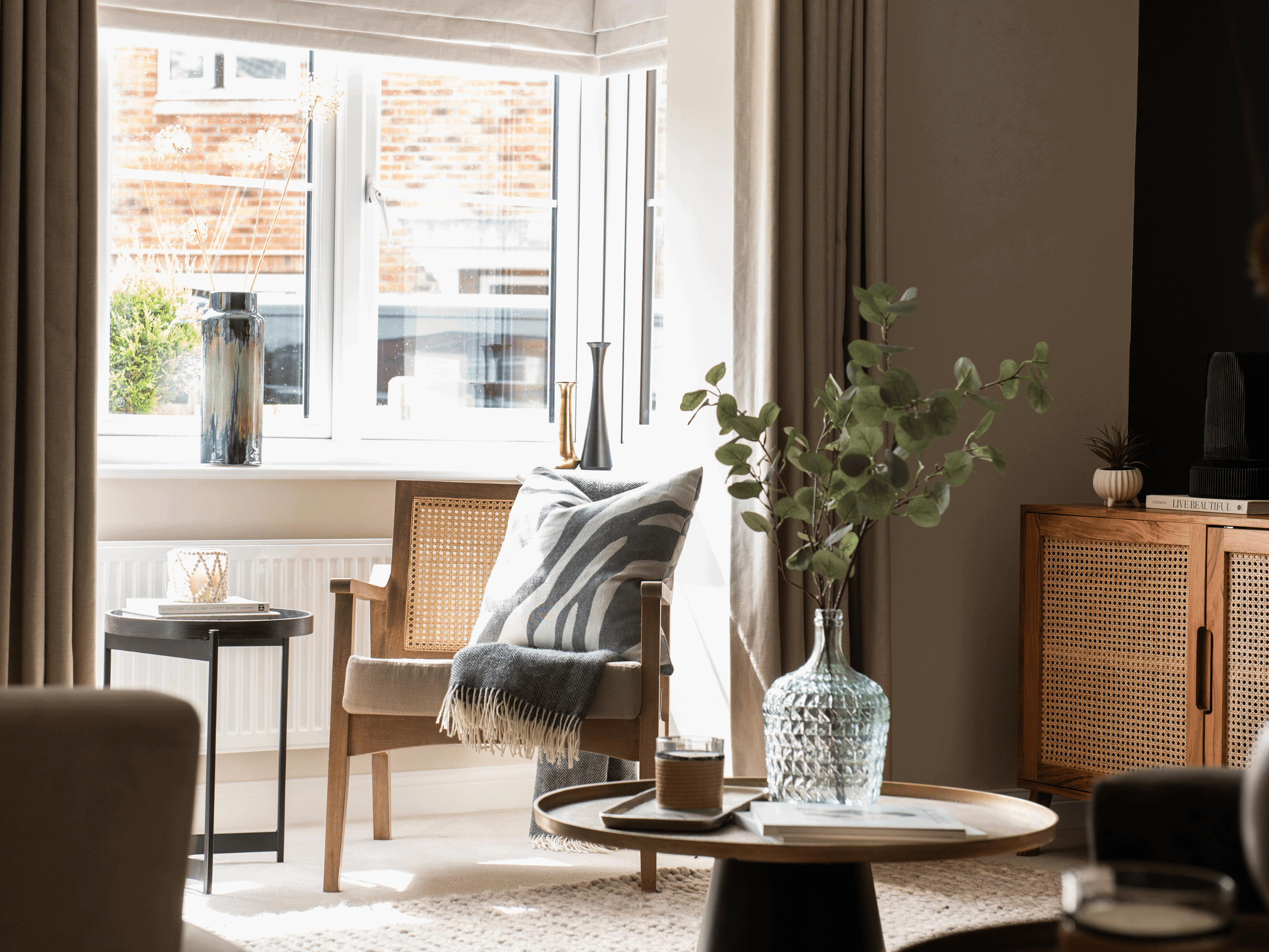 Interiors of Cameron Homes show homes featuring bespoke curtains and blinds by Jameson Seating, complementing family-friendly, modern living spaces.