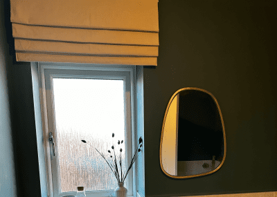 Interiors of show homes featuring bespoke curtains and blinds by Jameson Seating, complementing family-friendly, modern living spaces.