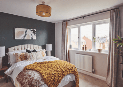 Interiors of show homes featuring bespoke curtains and blinds by Jameson Seating, complementing family-friendly, modern living spaces.