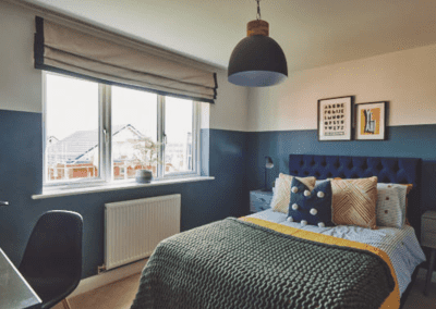 Interiors of show homes featuring bespoke curtains and blinds by Jameson Seating, complementing family-friendly, modern living spaces.