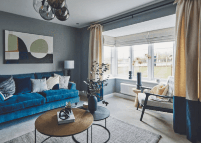 Interiors of show homes featuring bespoke curtains and blinds by Jameson Seating, complementing family-friendly, modern living spaces.