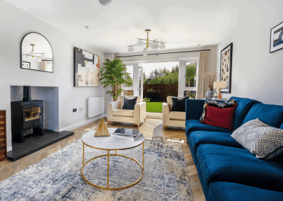 Interiors of show homes featuring bespoke curtains and blinds by Jameson Seating, complementing family-friendly, modern living spaces.