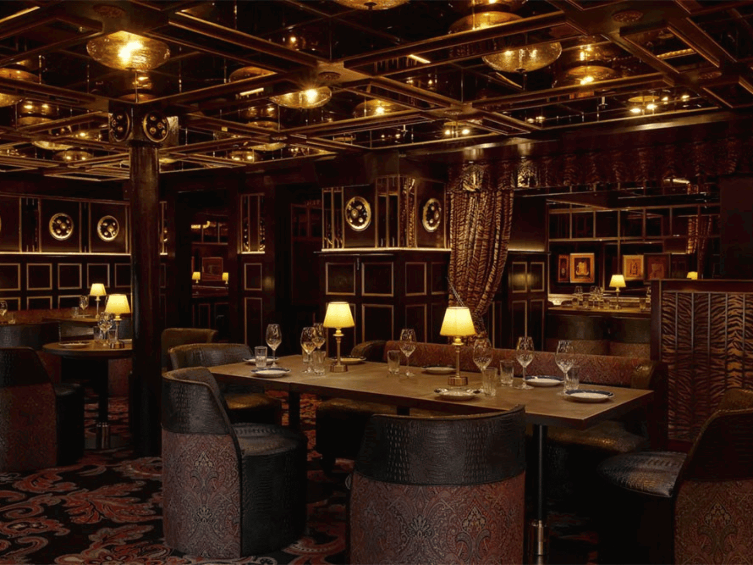 Bespoke curtains and soft furnishings at Ambassadors Clubhouse London, featuring luxurious fabrics and elegant design details that enhance the restaurant’s sophisticated atmosphere.