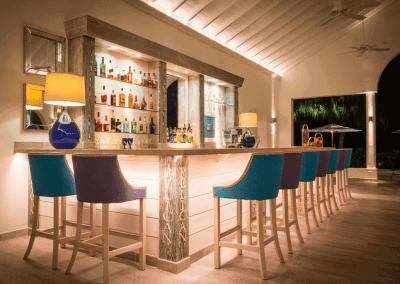 Handcrafted bespoke furniture supplied to Blue Waters Hotel, Antigua, showcasing British design, quality, and craftsmanship in a Caribbean setting.