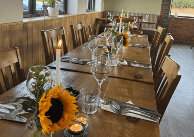 Bespoke café furniture featuring warm, rustic interiors and comfortable seating.