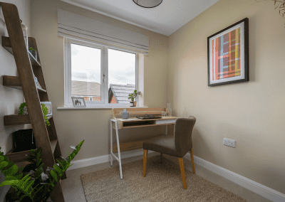 Interiors of show homes featuring bespoke curtains and blinds by Jameson Seating, complementing family-friendly, modern living spaces.