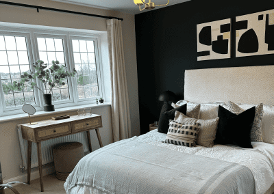 Interiors of show homes featuring bespoke curtains and blinds by Jameson Seating, complementing family-friendly, modern living spaces.
